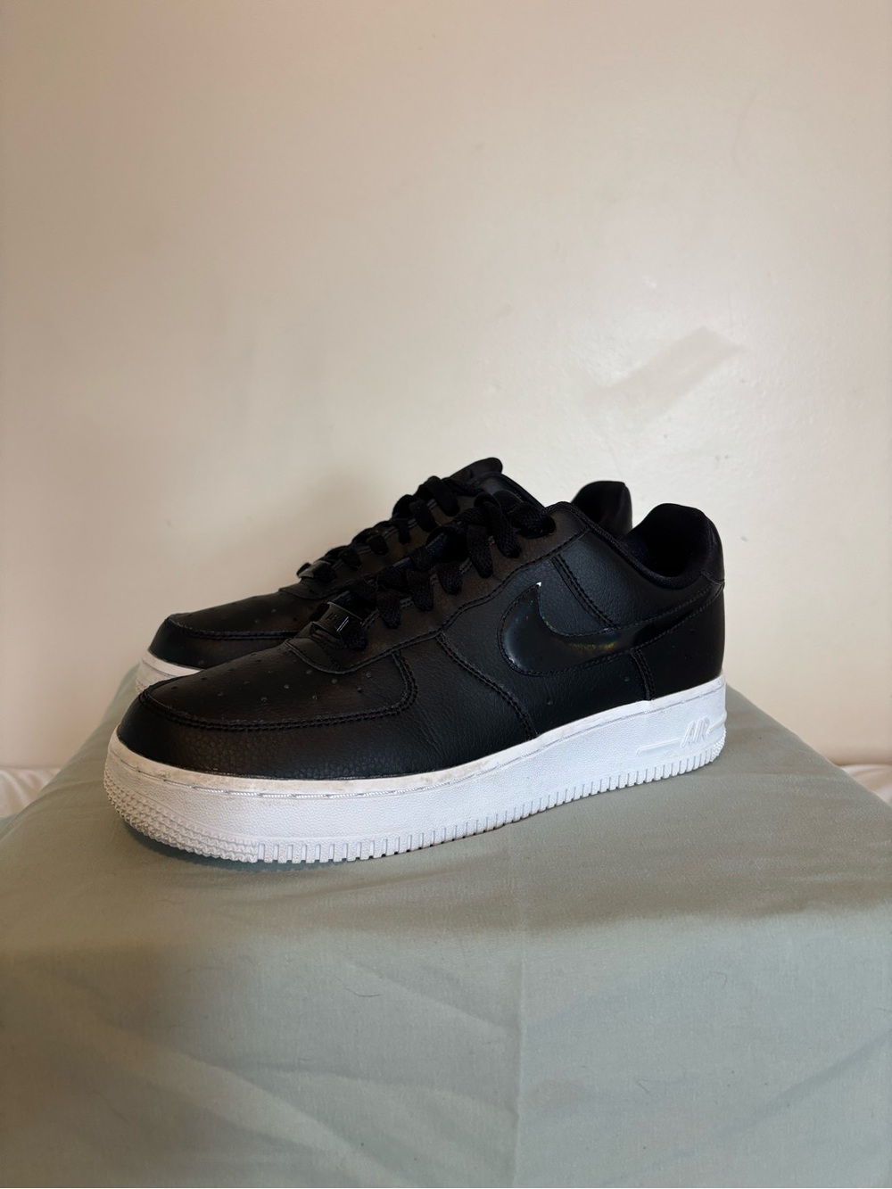 Women’s Nike black Air Force 1 with black iridescent swoosh